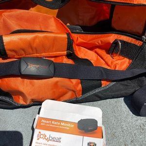 Orange theory heart rate monitor and duffel bag